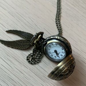 Long Harry Potter Snitch necklace with watch and steampunk vibe